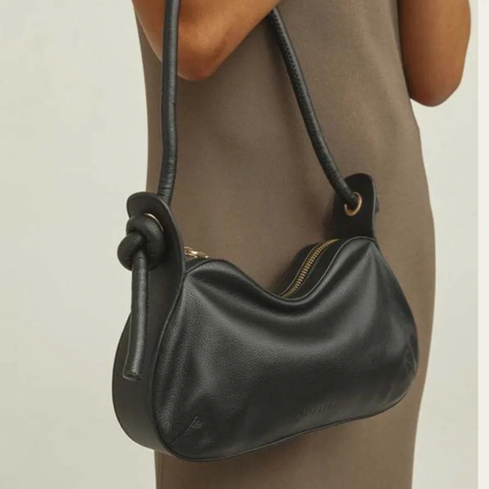 Brie Leon sleek black